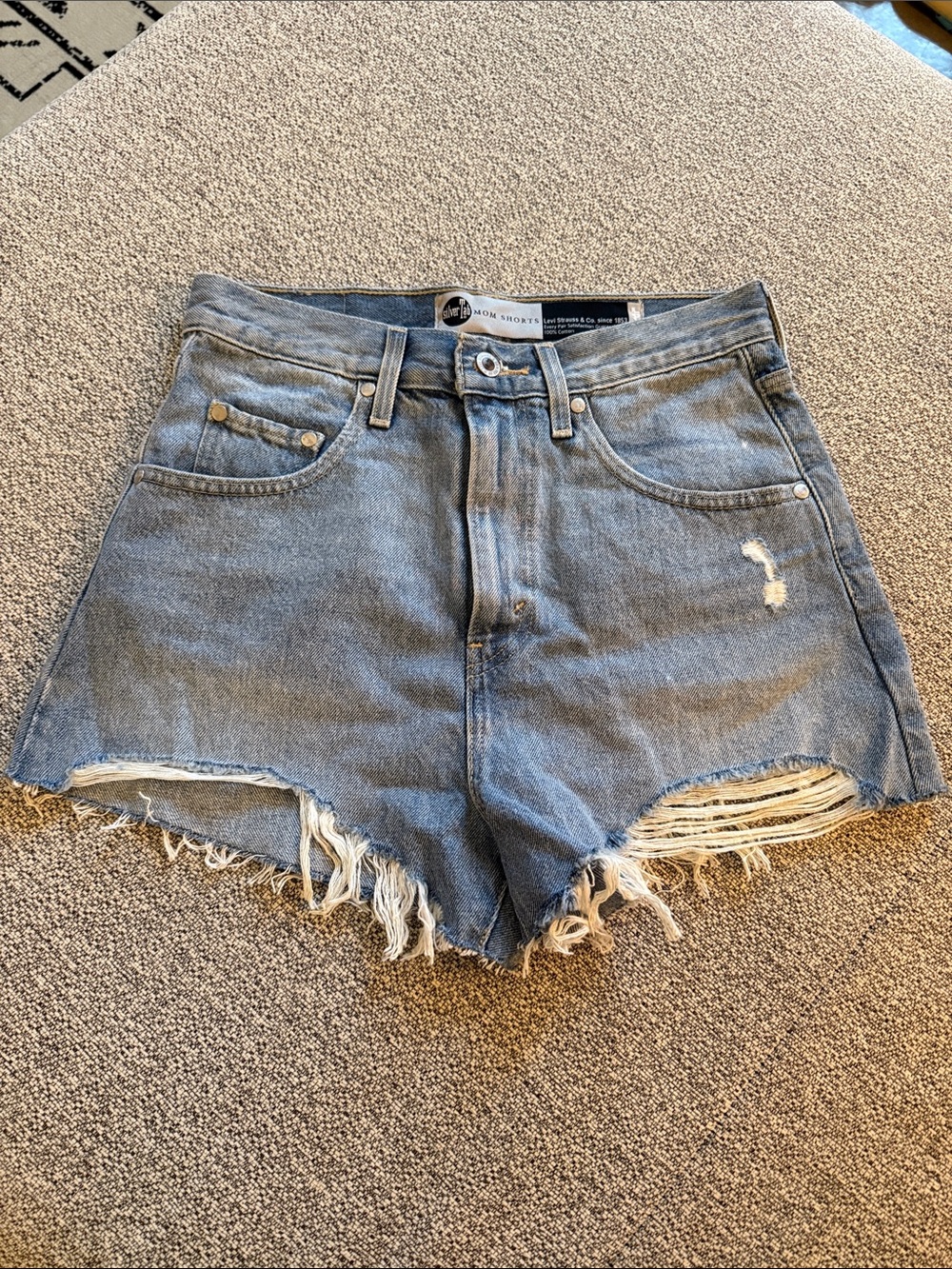 High-Rise Light Blue Distressed Denim Shorts